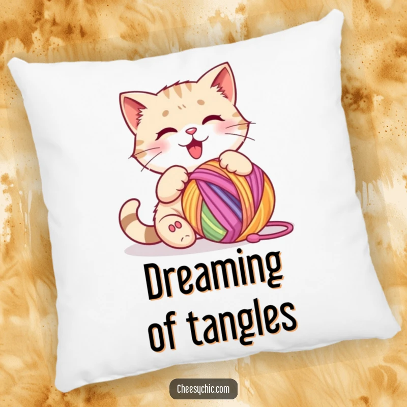Funny pillow featuring a cute cat character happily batting at a large, colorful ball of yarn with its paws.