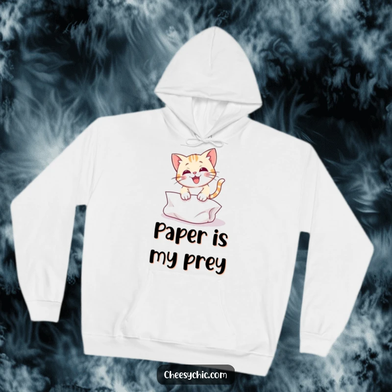 Funny hoodie depicting a cute cat character leaping dynamically onto a crumpled piece of paper, radiating energetic joy.