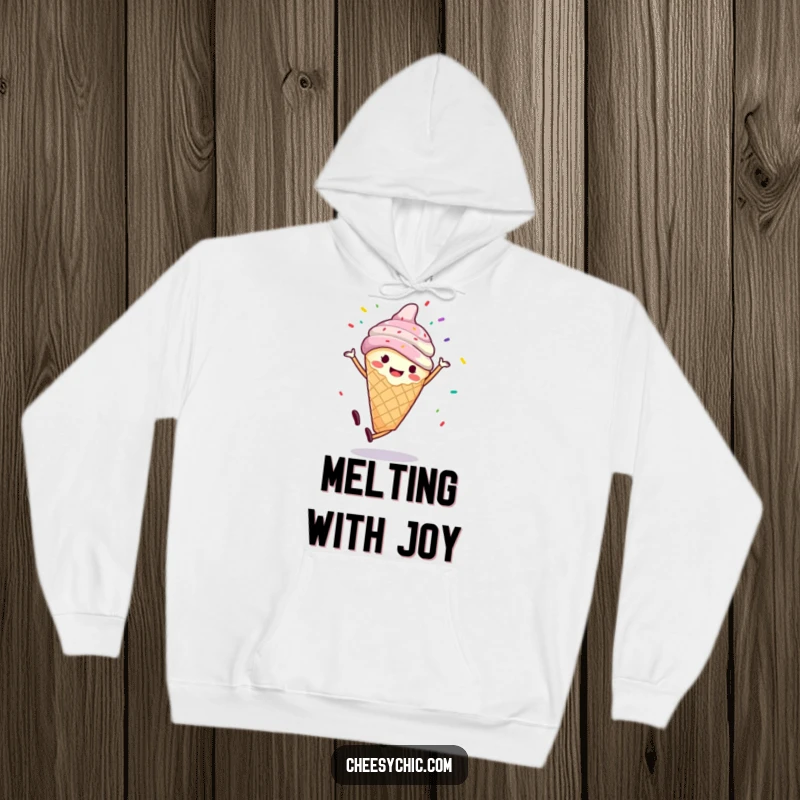 Funny hoodie featuring a smiling anthropomorphic ice cream cone performing a cartwheel with sprinkles flying, perfect for chilly days and happy moments.