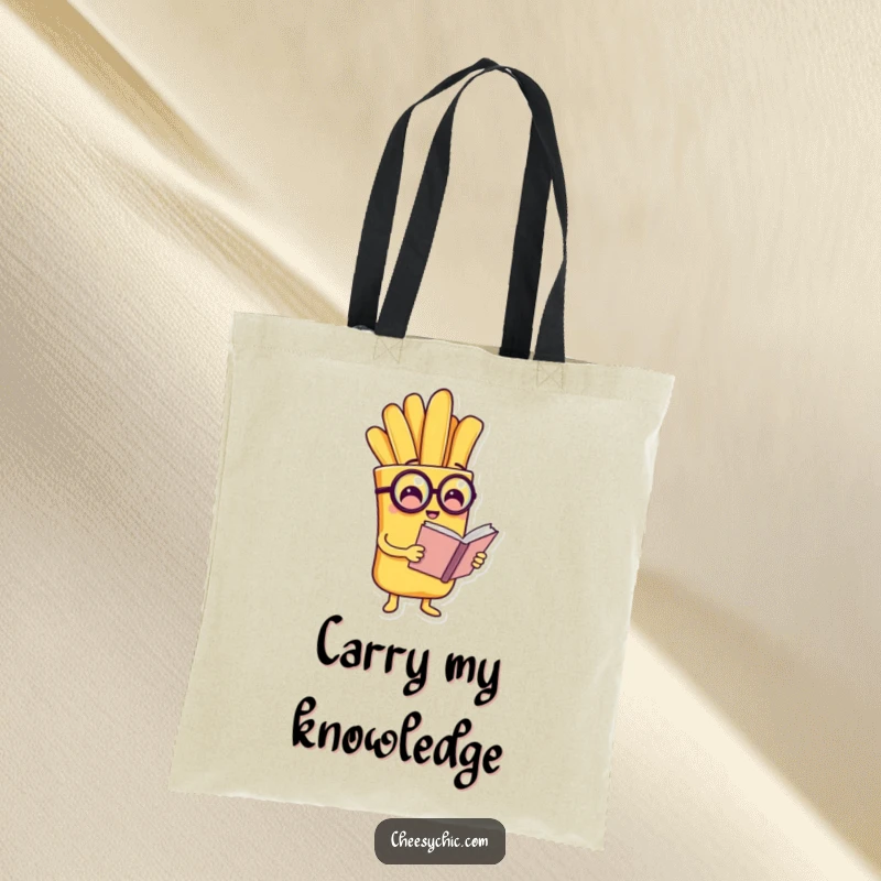 Funny tote bag showing a charming anthropomorphic french fry wearing a monocle and reading a tiny book, ready for adventure.