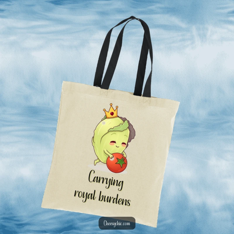 Funny tote bag with a clumsy anthropomorphic lettuce in a tiny crown falling over a tomato.