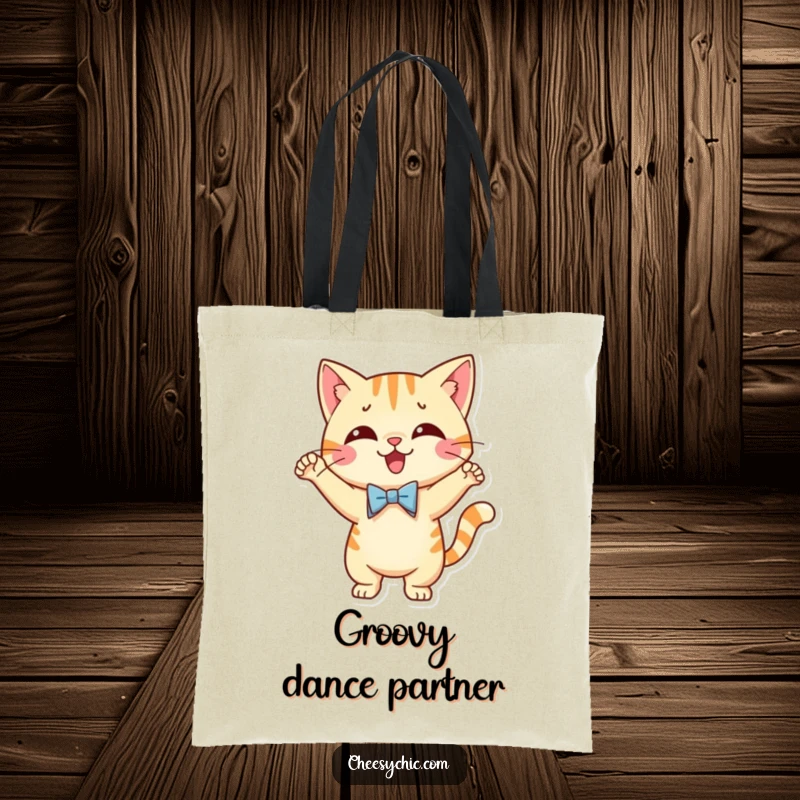 Funny tote bag featuring a cute cat character wearing a tiny bow tie and performing a silly, energetic dance.